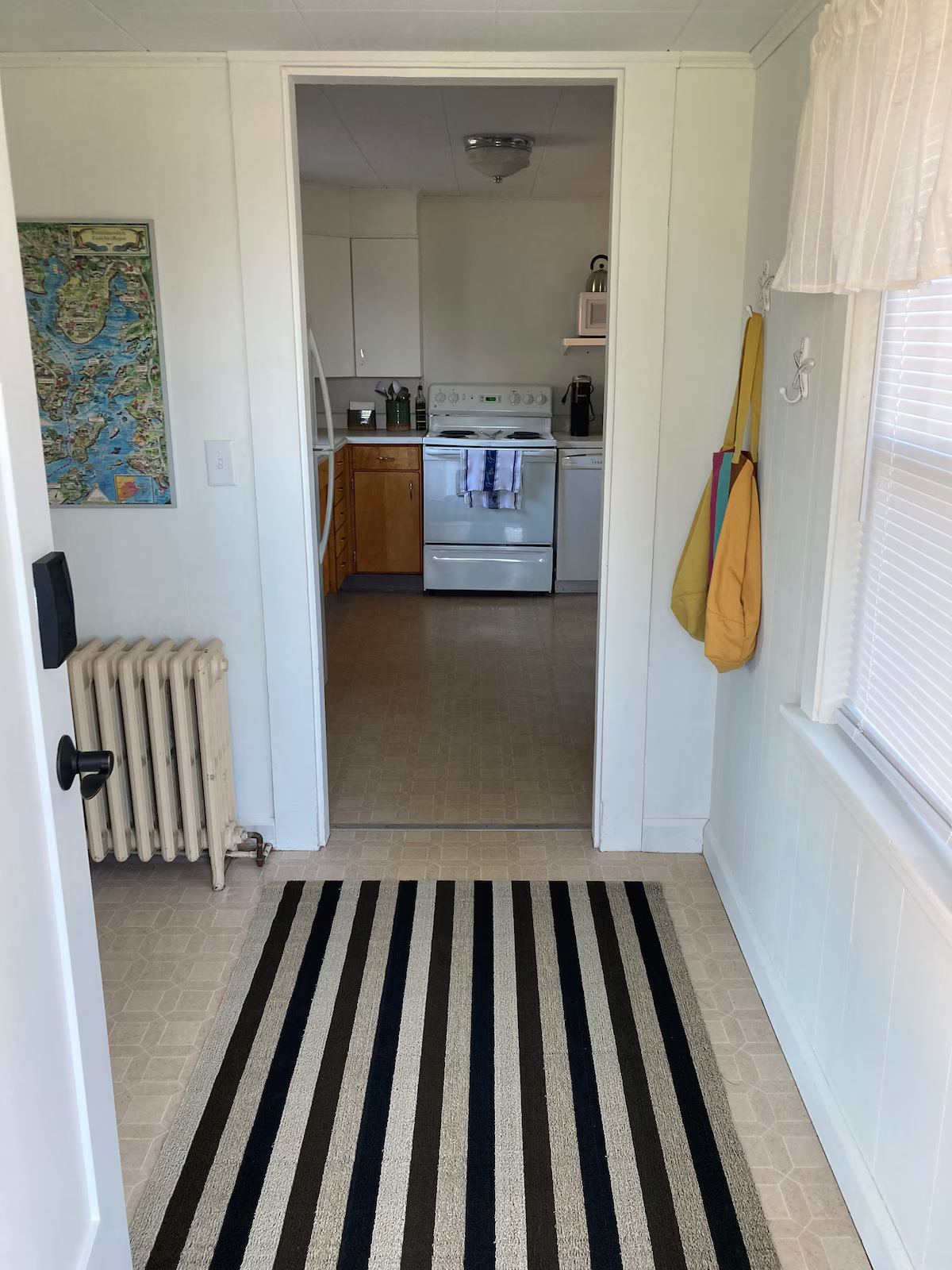 View from entry door area into kitchen. at Lubec Saltbox in Lubec