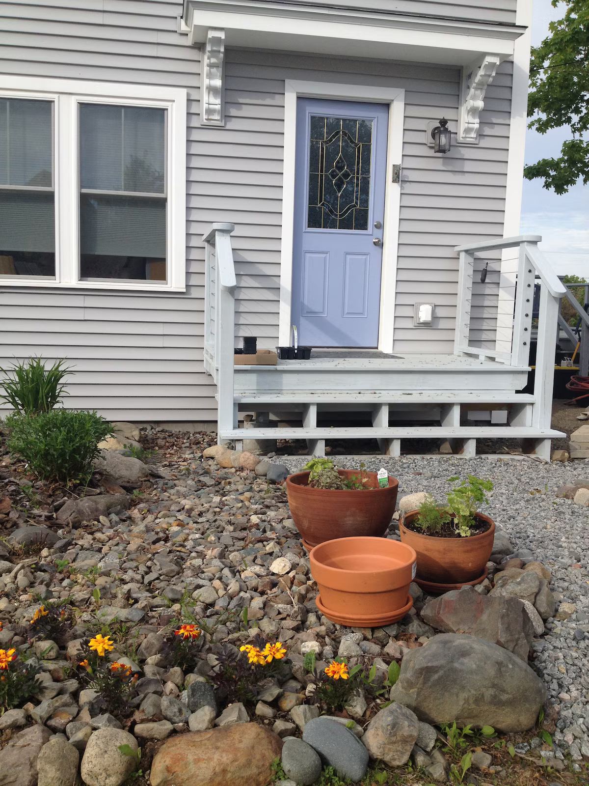 Early spring planting - those marigolds really took off later in the season. Those are herbs in the pots - great for seasoning culinary extravaganzas. at Horror Hill Cottage in Lub