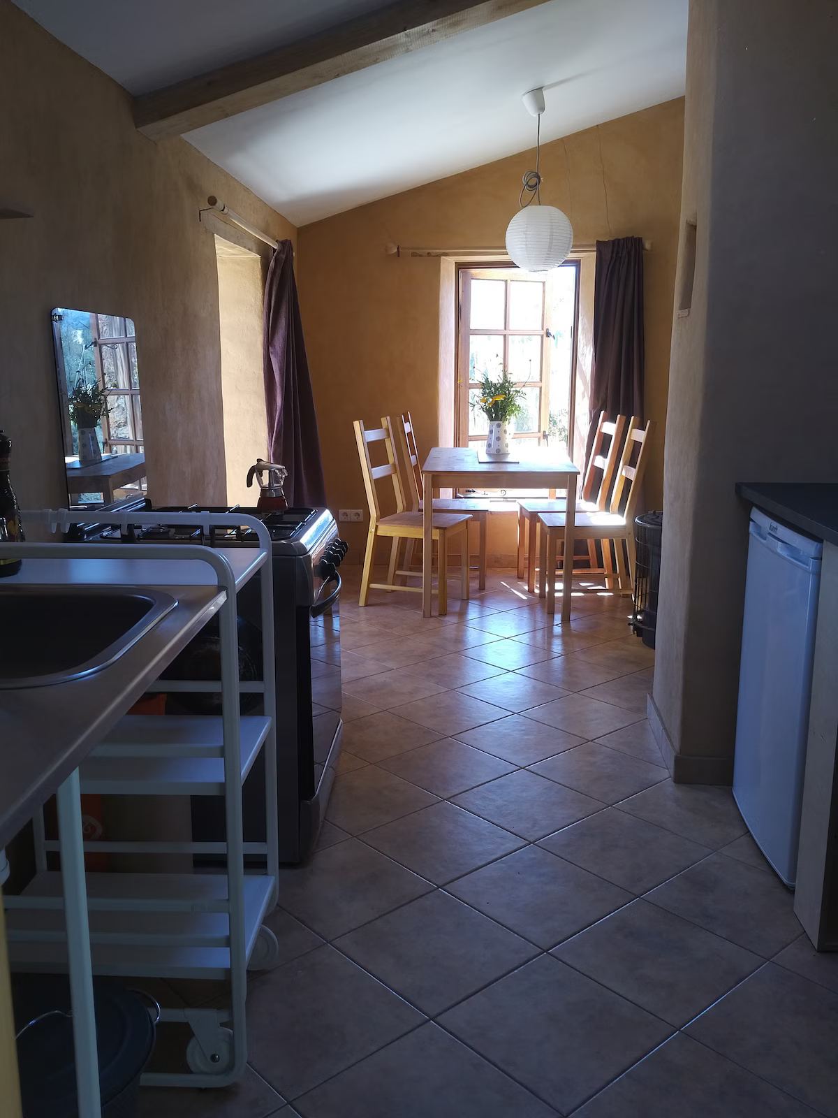 Open plan kitchen/dining at Quinta Tranquila in Odeceixe